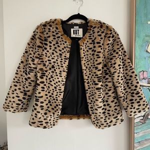 Kit from the Kloth brand jacket.